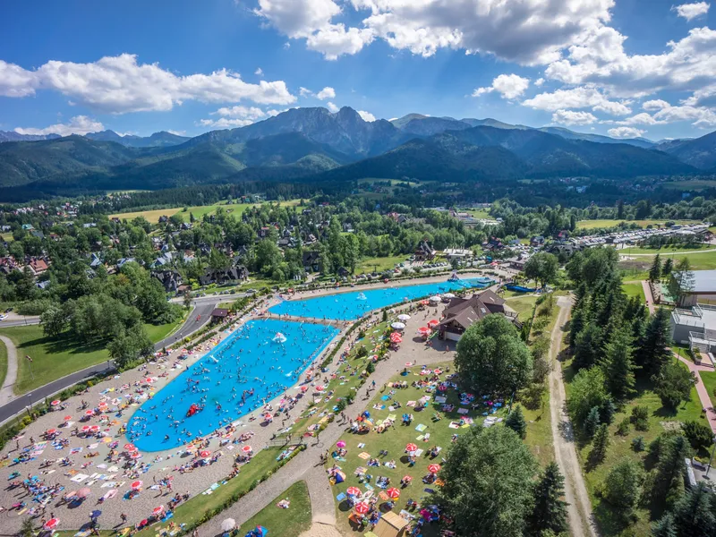 Outdoor pool at Polana Szymoszkowa with a view of the Tatras