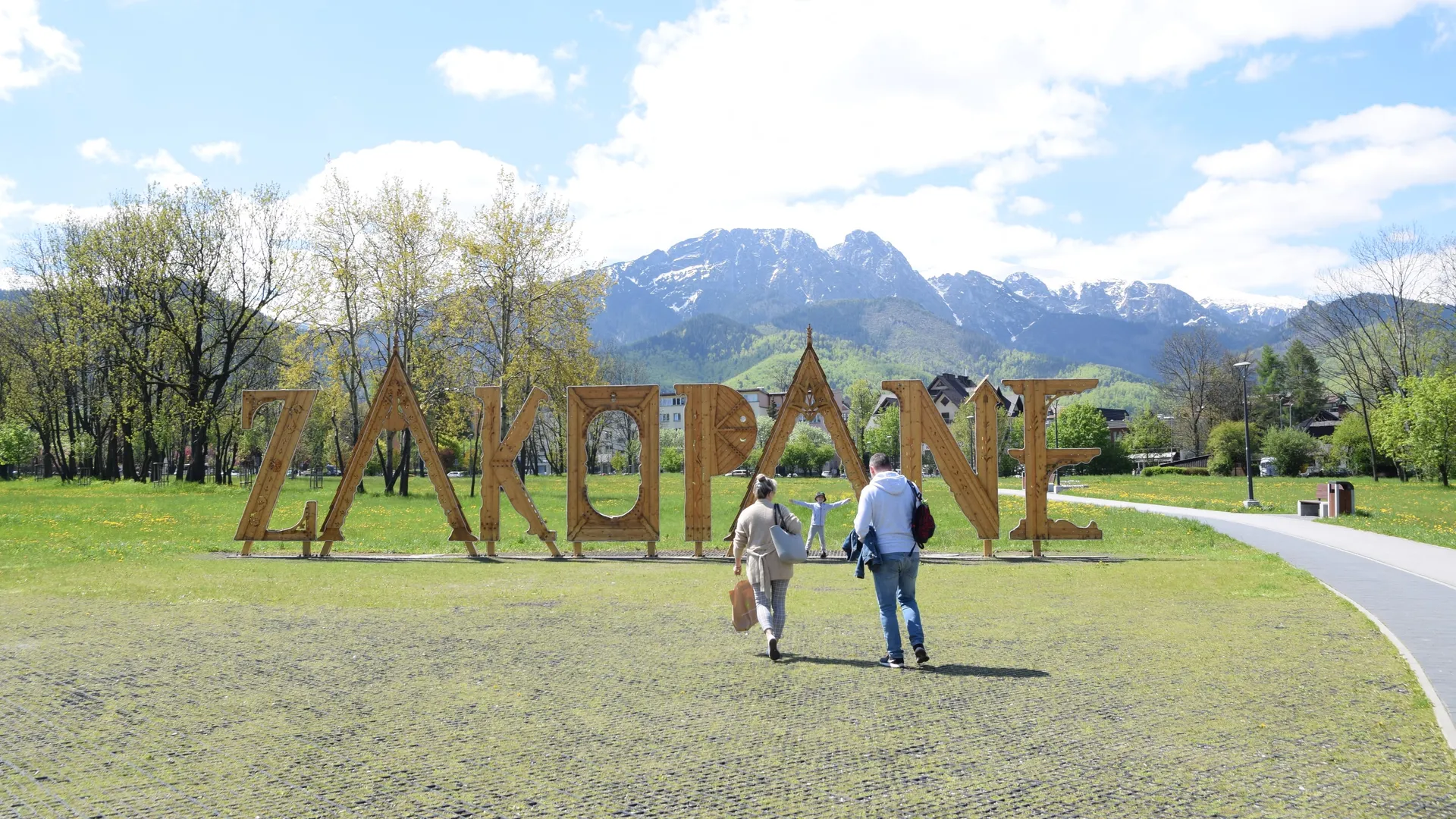 The word ZAKOPANE spelled out in large letters, with the Tatra Mountains behind